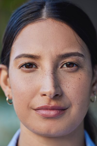 Closeup Portrait Of Mixed Race Woman's Face And Eyes Looking Forward And Into The Camera. Zoom Headshot Of A Hispanic Woman Staring And Watching In Front. Healthy Eyecare For Clear Optics And Vision